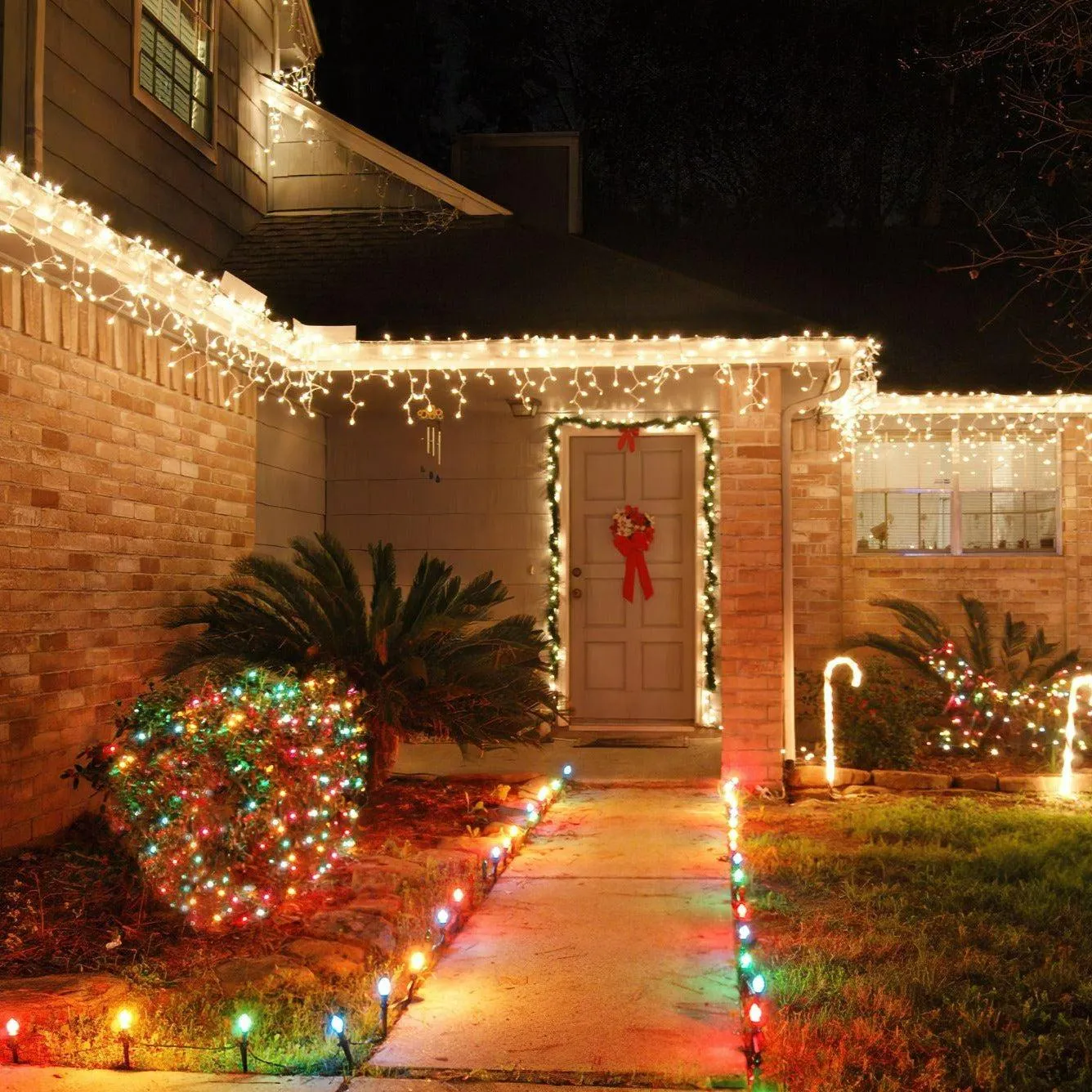 Battery Operated 8 Function LED Icicle Lights (180 Lights) - Warm White Lights